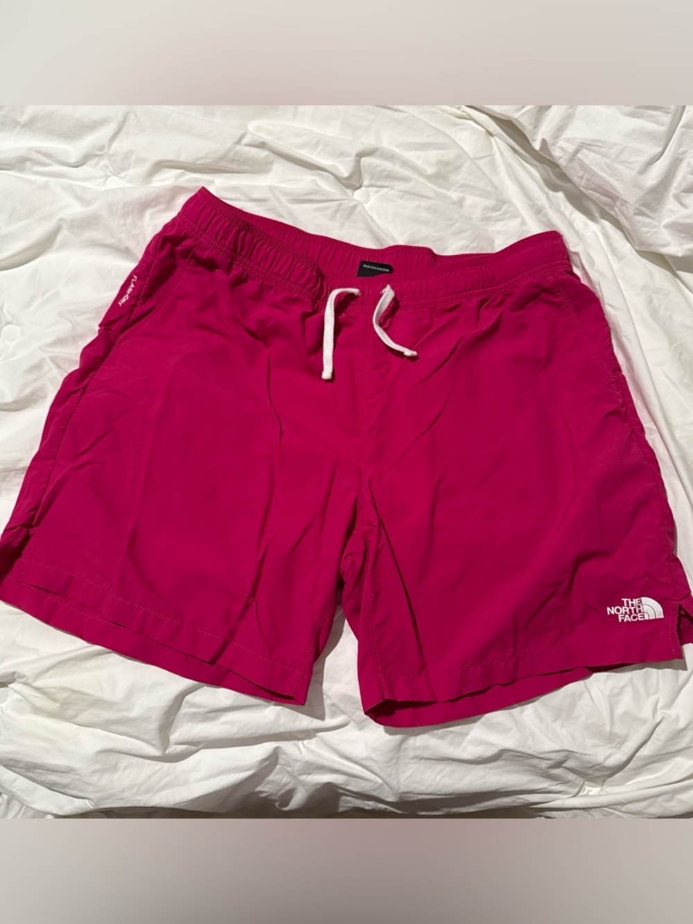 The North Face Men's Magenta Athletic Shorts with White Drawstring